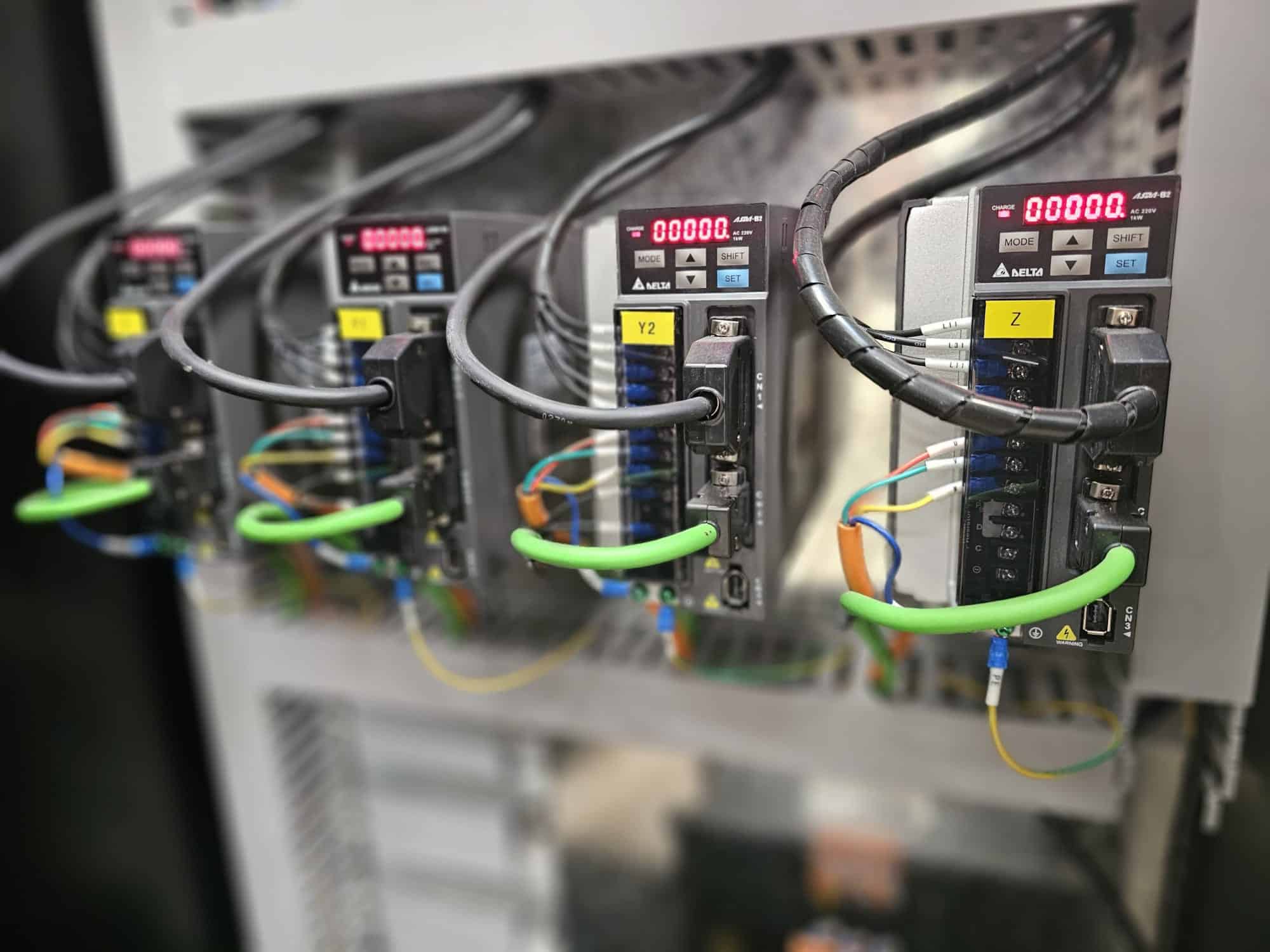 Reference image of servo drives; replace with Pegasus Yaskawa photograph